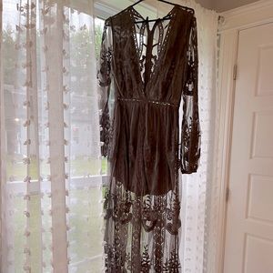 Size 8. Never worn. $100